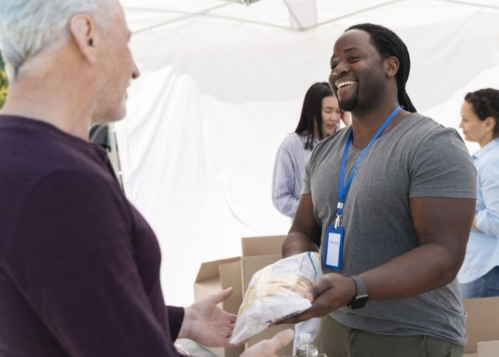 people-doing-volunteer-work-foodbank (1)